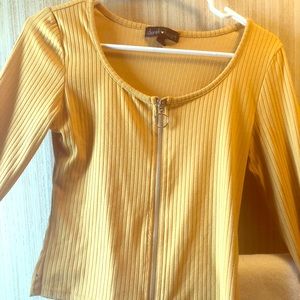 Long orange/yellow sleeve shirt